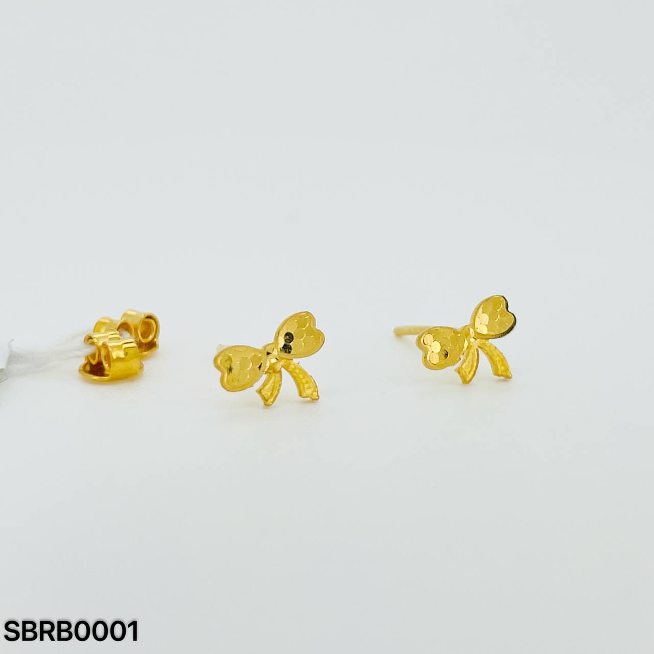 SUBANG RIBBON 蜂巢蝴蝶结耳环